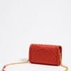 Mini Bolso con Solapa de Nylon Trenzado Color Coral