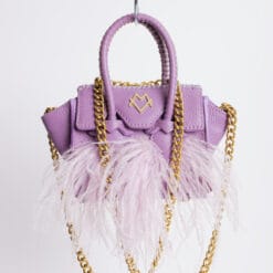 La Bebe en Lavanda con Plumas