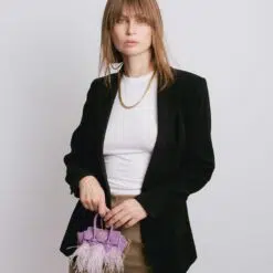 La Bebe en Lavanda con Plumas