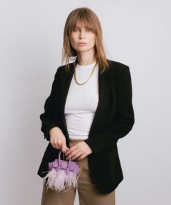 La Bebe en Lavanda con Plumas