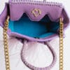 La Bebe en Lavanda con Plumas